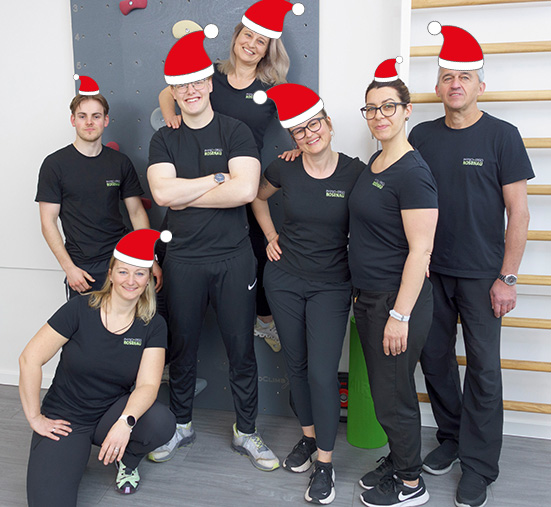 Team mit Weihnachtsmützen Team mit Weihnachtsmützen